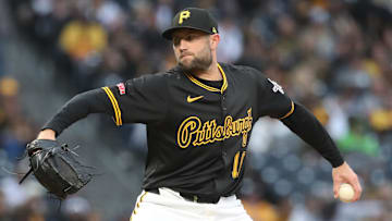 Apr 4, 2025; Pittsburgh, Pennsylvania, USA;  Pittsburgh Pirates relief pitcher Tim Mayza (18) pitches against the New York Yankees during the sixth inning at PNC Park. Mandatory Credit: Charles LeClaire-Imagn Images