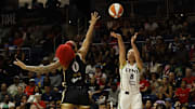 Jun 24, 2025; Washington, District of Columbia, USA; Minnesota Lynx forward Alanna Smith (8) shoots the ball over Washington Mystics forward Shakira Austin (0) in the second half at Entertainment & Sports Arena. Mandatory Credit: Geoff Burke-Imagn Images