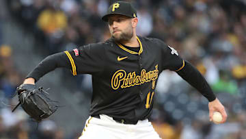 Apr 4, 2025; Pittsburgh, Pennsylvania, USA;  Pittsburgh Pirates relief pitcher Tim Mayza (18) pitches against the New York Yankees during the sixth inning at PNC Park. Mandatory Credit: Charles LeClaire-Imagn Images