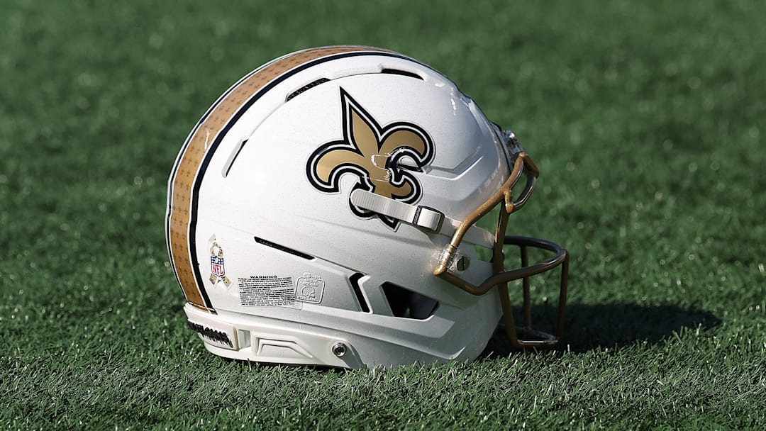 A New Orleans Saints helmet on the ground before a game against the Carolina Panthers on Nov. 9, 2025