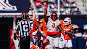 Oct 4, 2025; Tucson, Arizona, USA; Arizona Wildcats defensive lineman Deshawn McKnight (0) reacts after making a tackle against the Oklahoma State Cowboys during the second quarter at Arizona Stadium. Mandatory Credit: Aryanna Frank-Imagn Images
