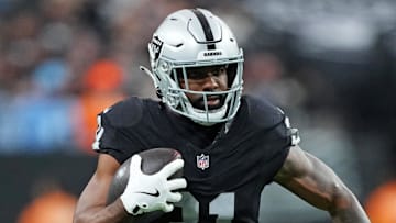 Nov 2, 2025; Paradise, Nevada, USA; Las Vegas Raiders running back Raheem Mostert (31) runs the ball during the second half against the Jacksonville Jaguars at Allegiant Stadium. Mandatory Credit: Kirby Lee-Imagn Images