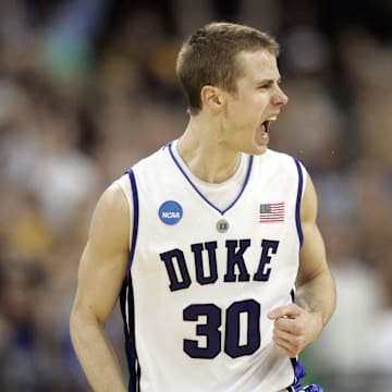 Jon Scheyer, who coached Duke to a win over Baylor Saturday, reacts during a Blue Devils game against the Bears in 2010.