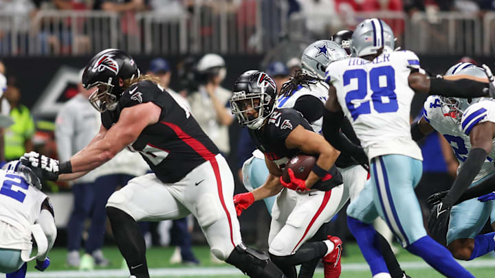 Nov 3, 2024; Atlanta, Georgia, USA; Atlanta Falcons wide receiver KhaDarel Hodge (12) runs after a catch against the Dallas Cowboys in the first quarter at Mercedes-Benz Stadium. Mandatory Credit: Brett Davis-Imagn Images