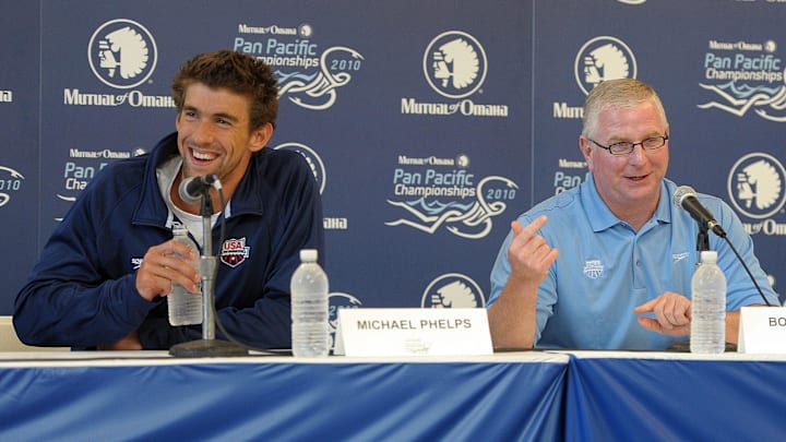 Aug 16, 2010; Irvine, CA, USA; Michael Phelps (left) and coach Bob Bowman at the 2010 Pan Pacific swimming championships press conference at the William at Woollett Jr. Aquatics Center. Mandatory Credit: Kirby Lee/Image of Sport-Imagn Images