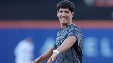 Jun 25, 2024; New York City, New York, USA; Kentucky Wildcats former guard Reed Sheppard throws an honorary first pitch before a game between the New York Mets and New York Yankees at Citi Field. Mandatory Credit: Brad Penner-USA TODAY Sports