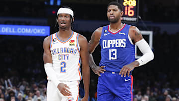 Oklahoma City Thunder guard Shai Gilgeous-Alexander and LA Clippers guard Paul George.