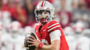 Ohio State Buckeyes quarterback Julian Sayin (10) drops back to pass during the first half of the Big Ten Conference championship game against the Indiana Hoosiers at Lucas Oil Stadium in Indianapolis on Dec. 6, 2025.