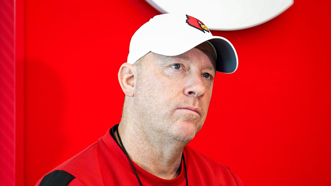 STILL FROM VIDEO: Louisville coach Jeff Brohm talks about facing Toledo in the Boca Raton Bowl.