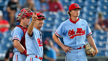 Ole Miss Head Coach Mike Bianco signals to the bullpen for a relief pitcher as he removes Ole Miss pitcher Drew McDaniel (21) after 6 and 2/3rds innings of shutout ball against Georgia during the SEC Tournament Thursday, May 27, 2021, in the Hoover Met in Hoover, Alabama. [Staff Photo/Gary Cosby Jr.]

Sec Tournament Georgia Vs Ole Miss