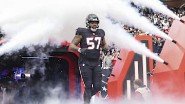 Dec 15, 2024; Houston Texans offensive tackle Blake Fisher (57) runs onto the field before the game against the Miami Dolphins at NRG Stadium. Mandatory Credit: Troy Taormina-Imagn Images