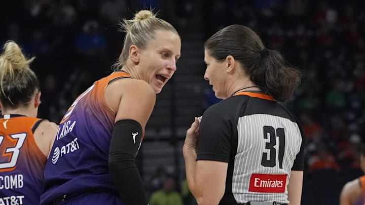 Jul 16, 2025; Minneapolis, Minnesota, USA; Phoenix Mercury guard Kitija Laksa (9) questions referee Amy Bonner on a call against her that benefitted the Minnesota Lynx in the third quarter at Target Center. Mandatory Credit: Bruce Kluckhohn-Imagn Images