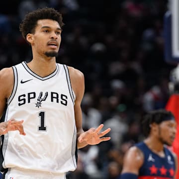 Feb 10, 2025; Washington, District of Columbia, USA; San Antonio Spurs center Victor Wembanyama (1) reacts after making a 3-point field goal during the first quarter against the Washington Wizards at Capital One Arena.
