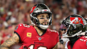Oct 21, 2024; Tampa, Florida, USA; Tampa Bay Buccaneers wide receiver Mike Evans (13) catches the ball for a touchdown  against the Baltimore Ravens during the first quarter at Raymond James Stadium. Mandatory Credit: Kim Klement Neitzel-Imagn Images
