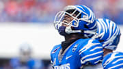 Memphis's Cortez Braham celebrates a touchdown against Arkansas Saturday.