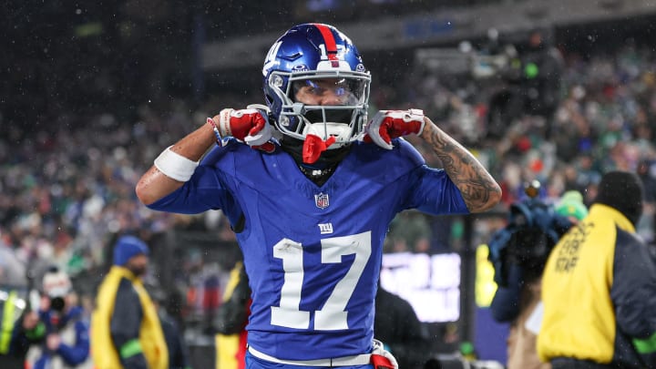 Jan 7, 2024; East Rutherford, New Jersey, USA; New York Giants wide receiver Wan'Dale Robinson (17) reacts after a first down reception during the first half against the Philadelphia Eagles at MetLife Stadium.  