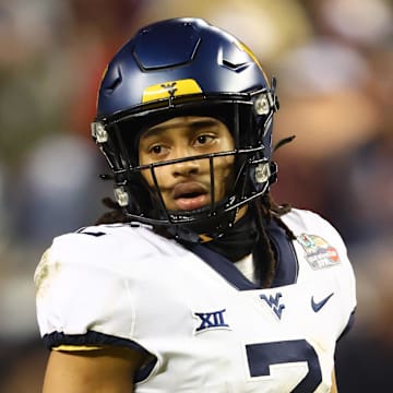 Dec 28, 2021; Phoenix, AZ, USA; West Virginia Mountaineers cornerback Daryl Porter Jr. (2) against the Minnesota Golden Gophers in the Guaranteed Rate Bowl at Chase Field. Mandatory Credit: Mark J. Rebilas-Imagn Images