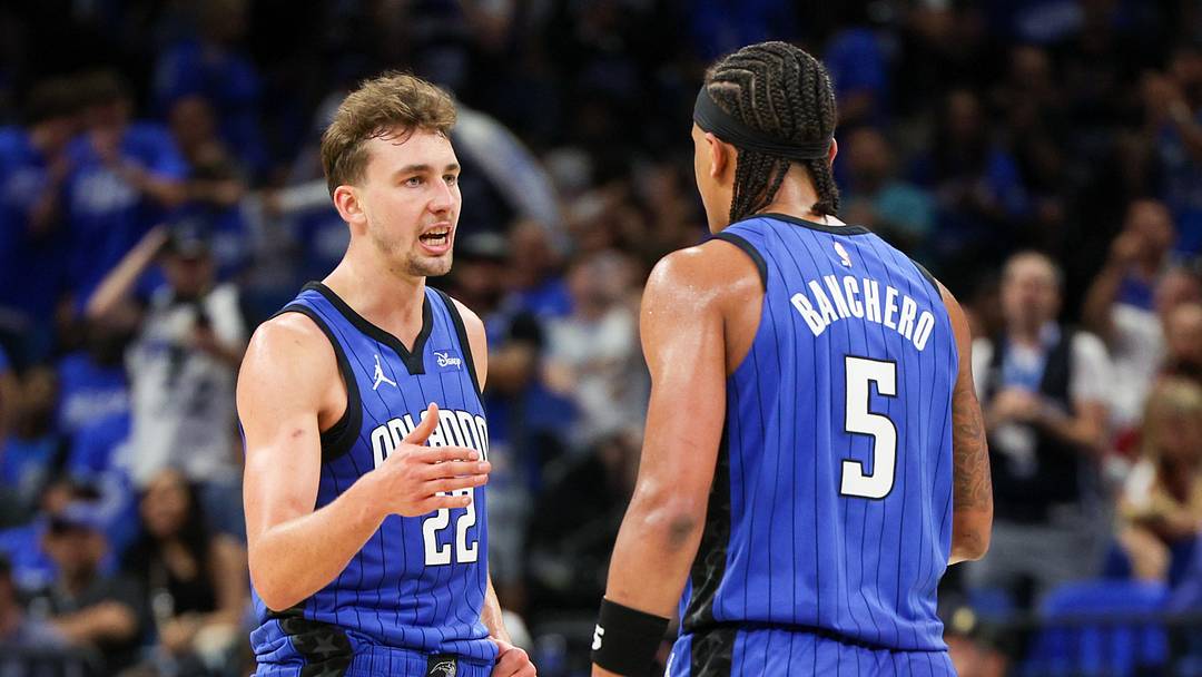 Apr 27, 2024; Orlando, Florida, USA; Orlando Magic forward Franz Wagner (22) and forward Paolo Banchero (5) celebrate after a basket against the Cleveland Cavaliers in the third quarter during game four of the first round for the 2024 NBA playoffs at Kia Center. Mandatory Credit: Nathan Ray Seebeck-USA TODAY Sports