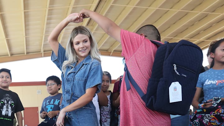 Blessings in a Backpack partnered with Vera Bradley to donate 600 backpacks to students at Tice Elementary. Every Friday the backpacks are filled with food for the students. Witney Carson from Dancing with the Stars is touring with Vera Bradley and was on hand to distribute the backpacks to students.