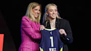 Paige Bueckers poses with WNBA commissioner Cathy Engelbert after being selected with the number one overall pick to the Dallas Wings in the 2025 WNBA Draft.