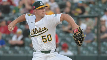 Aug 15, 2025; West Sacramento, California, USA; Athletics pitcher Jack Perkins (50) throws a pitch against the Los Angeles Angels during the first inning at Sutter Health Park. Mandatory Credit: Ed Szczepanski-Imagn Images