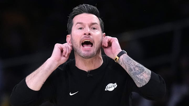 Apr 18, 2026; Los Angeles, California, USA; Los Angeles Lakers head coach JJ Redick reacts in the first half against the Houston Rockets during game one of the first round of the 2026 NBA Playoffs at Crypto.com Arena. Mandatory Credit: Kirby Lee-Imagn Images
