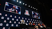 Oct 21, 2025; Kansas City, MO, USA; Arizona head coach Becky Burke (left) and Mickayla Perdue, Sumayah Sugapong and Noelani Cornfield speaks to media during Big 12 Womenís Basketball Media Day at T-Mobile Center. Mandatory Credit: Sophia Scheller-Imagn Images
