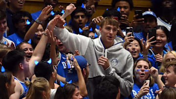 Oct 20, 2023; Durham, NC, USA; Duke Blue Devils recruit Cooper Flagg is greeted by fans during Countdown to Craziness at Cameron Indoor Stadium. Mandatory Credit: Rob Kinnan-Imagn Images