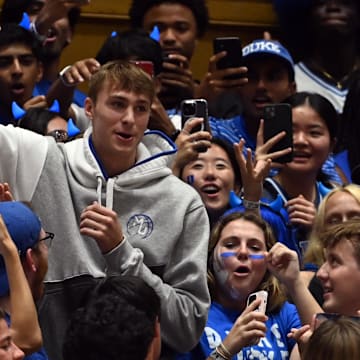 Oct 20, 2023; Durham, NC, USA; Duke Blue Devils recruit Cooper Flagg is greeted by fans during Countdown to Craziness at Cameron Indoor Stadium. Mandatory Credit: Rob Kinnan-Imagn Images