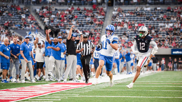 BYU wide receiver Parker Kingston scores a touchdown against Arizona