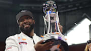 Jackson State Head Coach TC Taylor hoists the 2024 Cricket Celebration Bowl Trophy as the Tigers defeated South Carolina State 28-7 at Mercedes-Benz Stadium.  December 14, 2024; Credit: Kyle T. Mosley, HBCU Legends