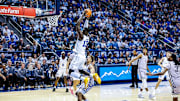 BYU basketball center Keba Keita rises up for a dunk against Kansas State