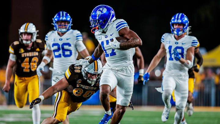 Keelan Marion scores a touchdown on a kickoff return against Wyoming