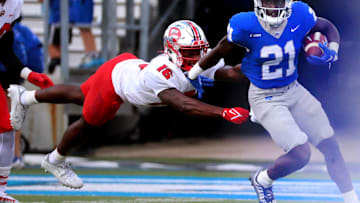 MTSU running back Joe Ervin (21) runs the ball as Western defensive back Kendrick Simpkins (16)