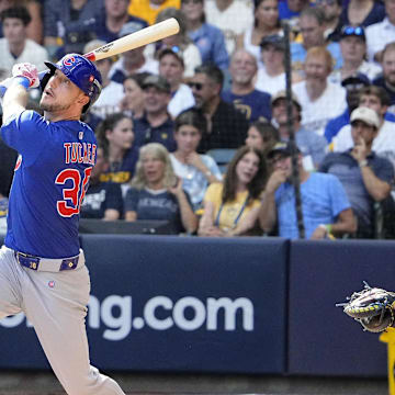 Oct 4, 2025; Milwaukee, Wisconsin, USA; Chicago Cubs designated hitter Kyle Tucker (30) flies out against the Milwaukee Brewers during the sixth inning of game one of the NLDS round for the 2025 MLB playoffs at American Family Field. Mandatory Credit: Michael McLoone-Imagn Images