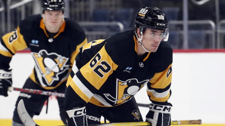 Sep 24, 2023; Pittsburgh, Pennsylvania, USA; Pittsburgh Penguins center Brayden Yager (62) prepares to take a face-off against the Columbus Blue Jackets during the third period at PPG Paints Arena. Pittsburgh won 3-2 in a shootout. Mandatory Credit: Charles LeClaire-USA TODAY Sports