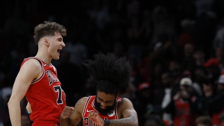 Apr 12, 2024; Washington, District of Columbia, USA; Chicago Bulls forward Henri Drell (77) celebrates with Bulls guard Coby White (0) after their game against the Washington Wizards at Capital One Arena. Mandatory Credit: Geoff Burke-USA TODAY Sports