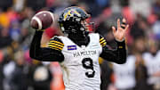 Dec 5, 2021; Toronto, Ontario, CAN; Hamilton Tiger-Cats quarterback Dane Evans (9) goes to throw a pass against the Toronto Argonauts during the Canadian Football League Eastern Conference Final game at BMO Field. Mandatory Credit: John E. Sokolowski-Imagn Images