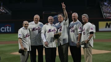 August 22, 2009; Queens, NY, USA; Yogi Berra, Nolan Ryan, Jerry Grote, Tom Seaver, Jerry Koosman and Duffy Dyer recognize Mets fans before the start of the  Saturday night game against the Phillies.  Ryan, Seaver and Koosman threw out the first pitches in recognition of the 40th anniversary of the 1969 world championship team while Berra, Grote and Dyer caught them. Mandatory Credit: Kevin R.Wexler-USA TODAY NETWORK