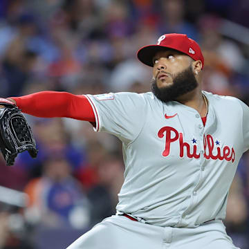 Oct 8, 2024; New York City, New York, USA; Philadelphia Phillies pitcher Jose Alvarado (46) pitches in the seventh inning against the New York Mets during game three of the NLDS for the 2024 MLB Playoffs at Citi Field.
