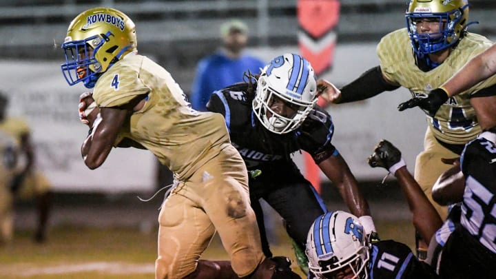 Taevion Swint of Osceola runs through the Rockledge defense during their game Friday, September 23, 2022. Craig Bailey/FLORIDA TODAY via USA TODAY NETWORK

High School Football Osceola Kowboys At Rockledge Raiders