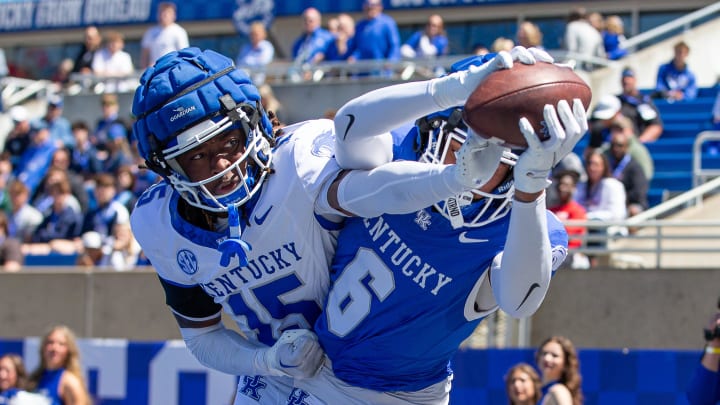 Kentucky wide receiver Dane Key (5) hauled in a touchdown over defensive back Jeremiah Anglin, Jr. (15) during the Kentucky Wildcats' Blue White scrimmage at Kroger Field on Saturday afternoon in Lexington, Kentucky. April 13, 2024