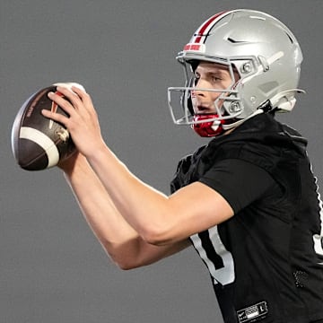 Ohio State Buckeyes quarterback Julian Sayin (10) takes a snap during spring football practice at the Woody Hayes Athletic Center on March 17, 2025.