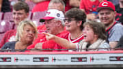 Cincinnati Reds fans cheer in the ninth inning of the MLB National League game between the Cincinnati Reds and the Pittsburgh Pirates at Great American Ball Park in downtown Cincinnati on Thursday, Sept. 25, 2025. The Reds won, 2-1.