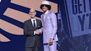 Jun 25, 2025; Brooklyn, NY, USA;  Asa Newell stands with NBA commissioner Adam Silver after being selected as the 23rd pick by the New Orleans Pelicans in the first round of the 2025 NBA Draft at Barclays Center. Mandatory Credit: Brad Penner-Imagn Images