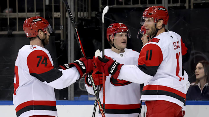 Feb 5, 2026; New York, New York, USA; Carolina Hurricanes center Jordan Staal (11) celebrates his empty net goal against the New York Rangers with teammates during the third period at Madison Square Garden. Mandatory Credit: Brad Penner-Imagn Images