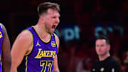Feb 25, 2025; Los Angeles, California, USA; Los Angeles Lakers guard Luka Doncic (77) reacts against the Dallas Mavericks during the first quarter at Crypto.com Arena. Mandatory Credit: Gary A. Vasquez-Imagn Images