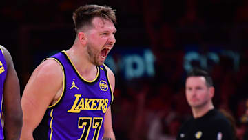 Feb 25, 2025; Los Angeles, California, USA; Los Angeles Lakers guard Luka Doncic (77) reacts against the Dallas Mavericks during the first quarter at Crypto.com Arena. Mandatory Credit: Gary A. Vasquez-Imagn Images
