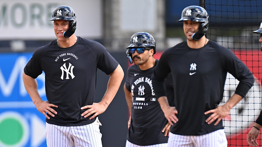 Feb 16, 2026; Tampa, FL, USA; New York Yankees outfielder Aaron Judge (99) and outfielder Giancarlo Stanton (27) run the bases during spring training at George M. Steinbrenner Field. Mandatory Credit: Jonathan Dyer-Imagn Images