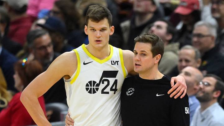 Dec 20, 2023; Cleveland, Ohio, USA; Utah Jazz center Walker Kessler (24) talks with head coach Will Hardy in the second quarter against the Cleveland Cavaliers at Rocket Mortgage FieldHouse. Mandatory Credit: David Richard-USA TODAY Sports